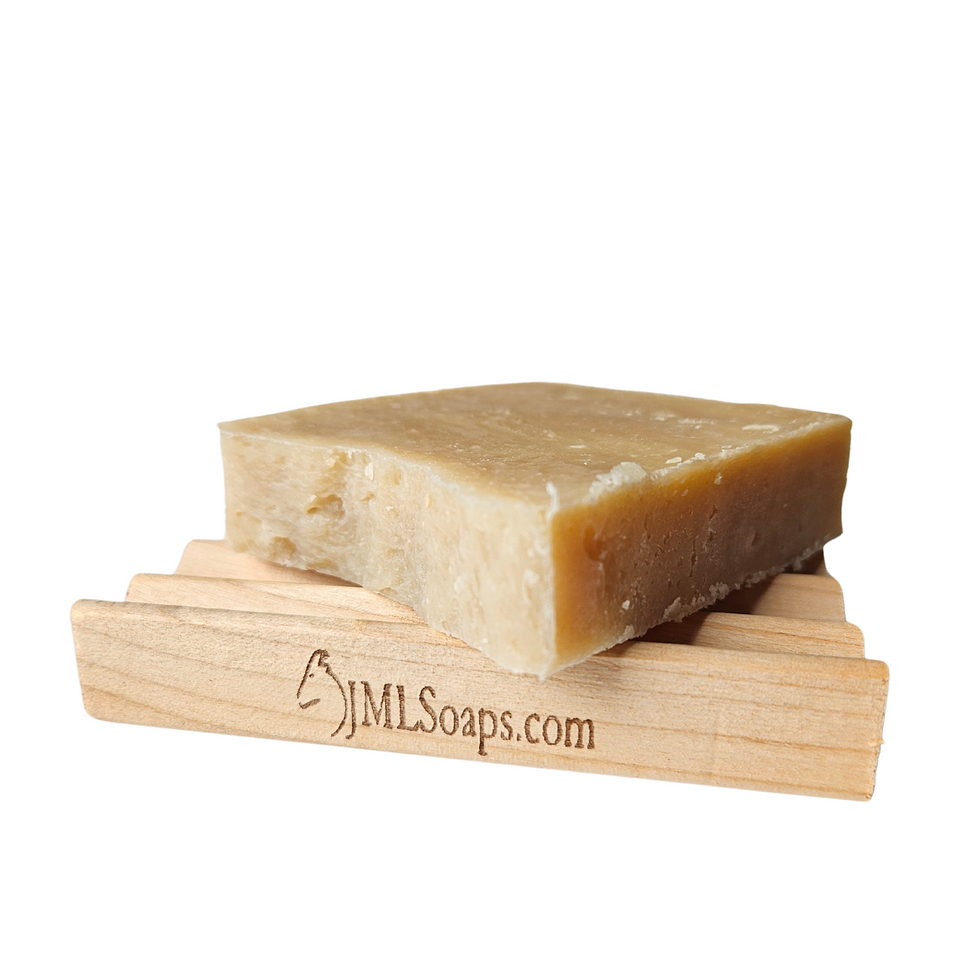 Thumbnail: wood soap tray with soap bar sitting on top
