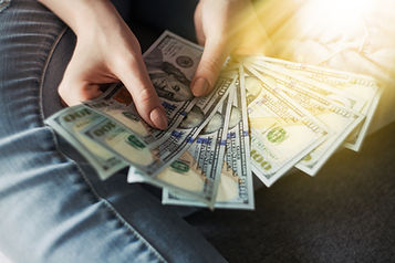 Girl holding American Dollar Bills_edite