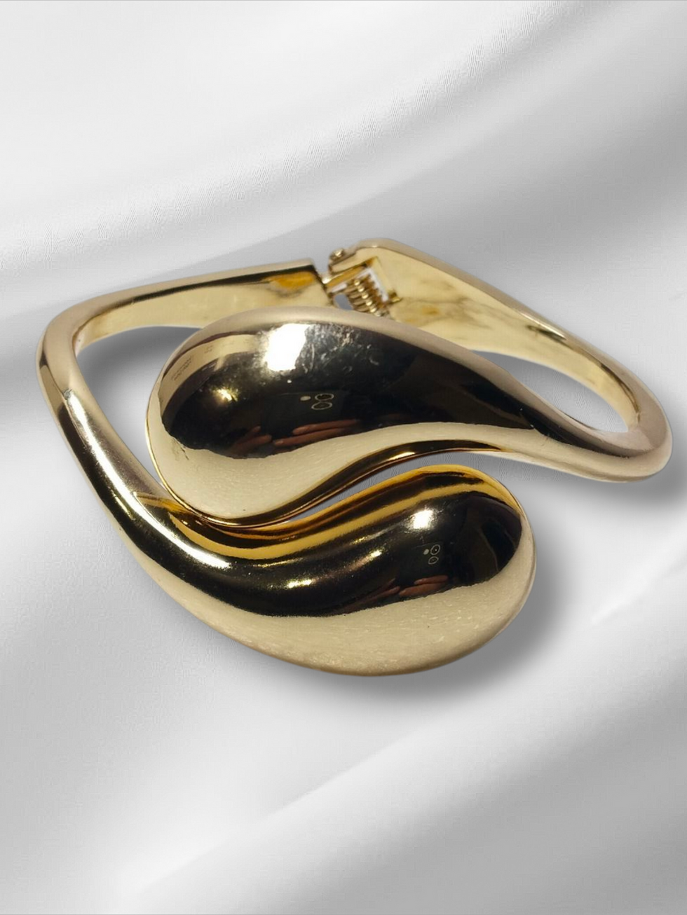 Elegant golden bracelet on white background, lavish jewellery piece Zirconia Gold Colour Earring.