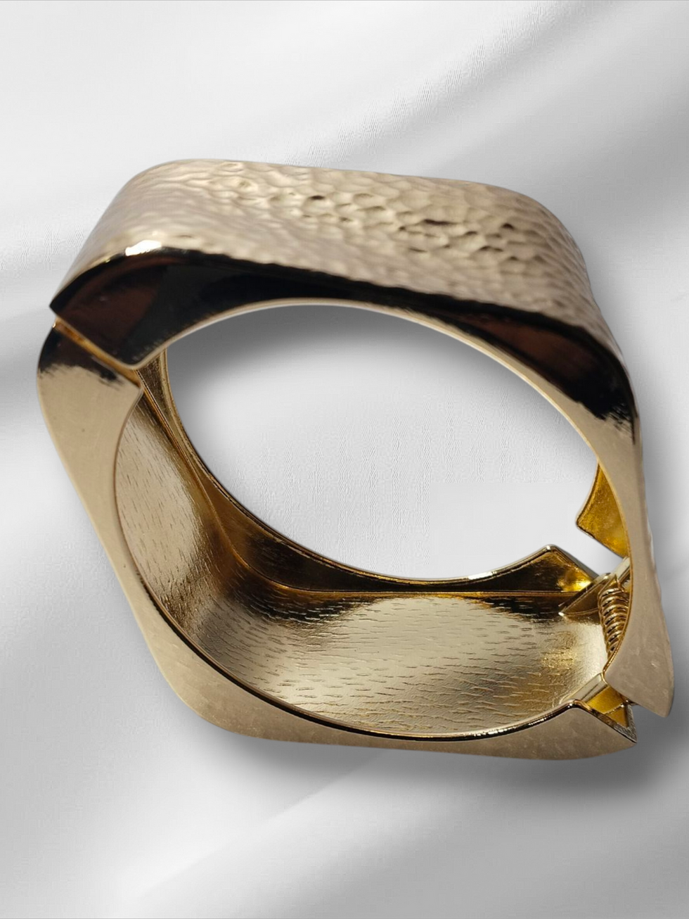 Gold bracelet on white background. Lavish Jewellery elegant design for fashion.