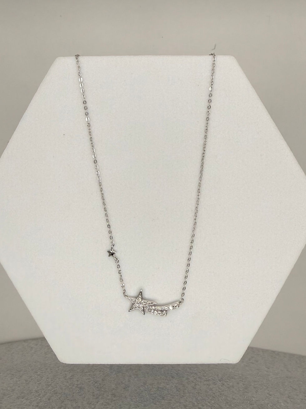 Silver necklace with 'Forever' text, on white display. Lavish Jewellery.