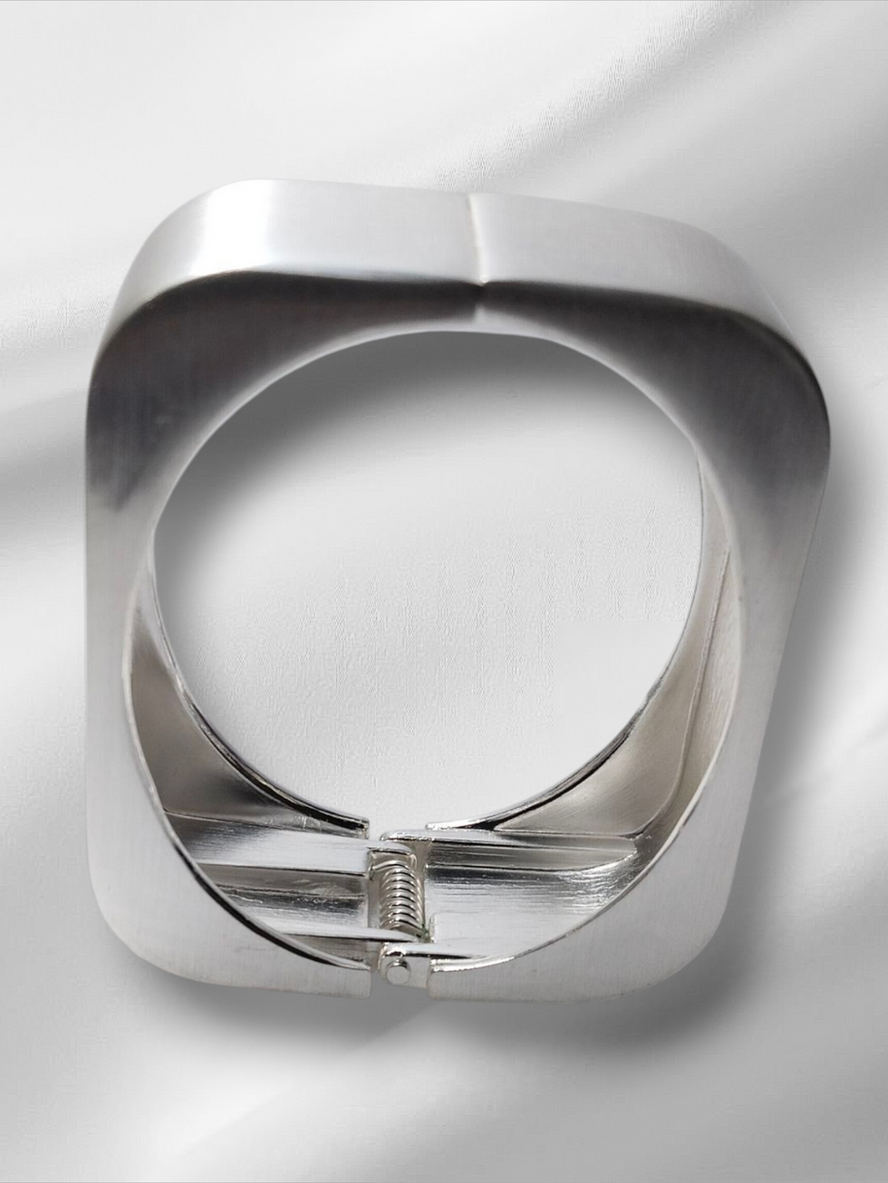 Silver square bracelet on white background, Lavish Jewellery.