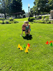 Child and mom participating in outreach event