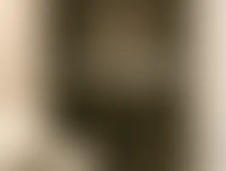 Modern bathroom remodel in Monroe GA featuring a dark gray tiled walk-in shower with built-in niche and bench