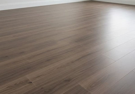 "Professional installation of durable, dark wood laminate flooring in a modern residential room." in Snellville, GA."