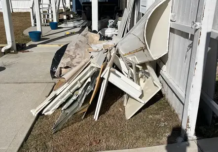 "Post-construction site cleanup and debris removal service for a home renovation project in Between, GA."