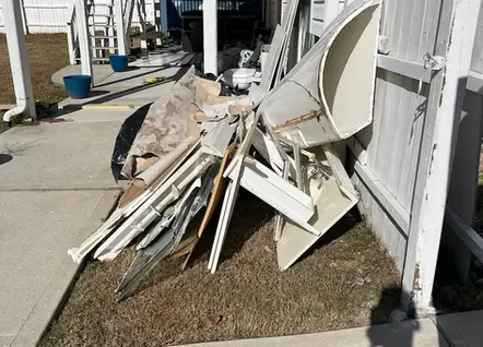 "Post-construction site cleanup and debris removal service for a home renovation project in Lawrenceville, GA."