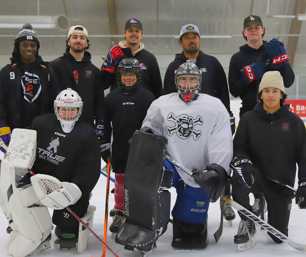 Volonteers and coaches alongside Theron Morningstar to support Indigenous Youth through sport