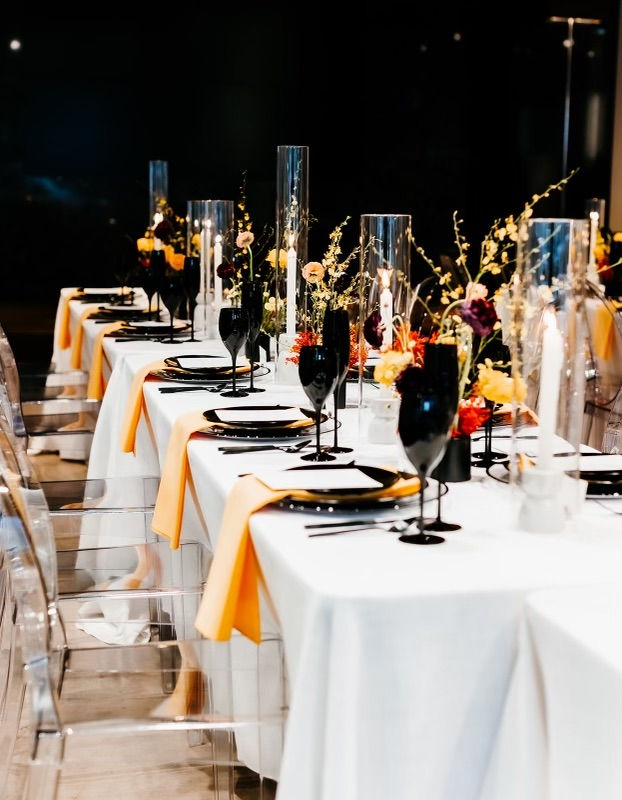 Zucker Foundation - table and chairs and table settings with floral