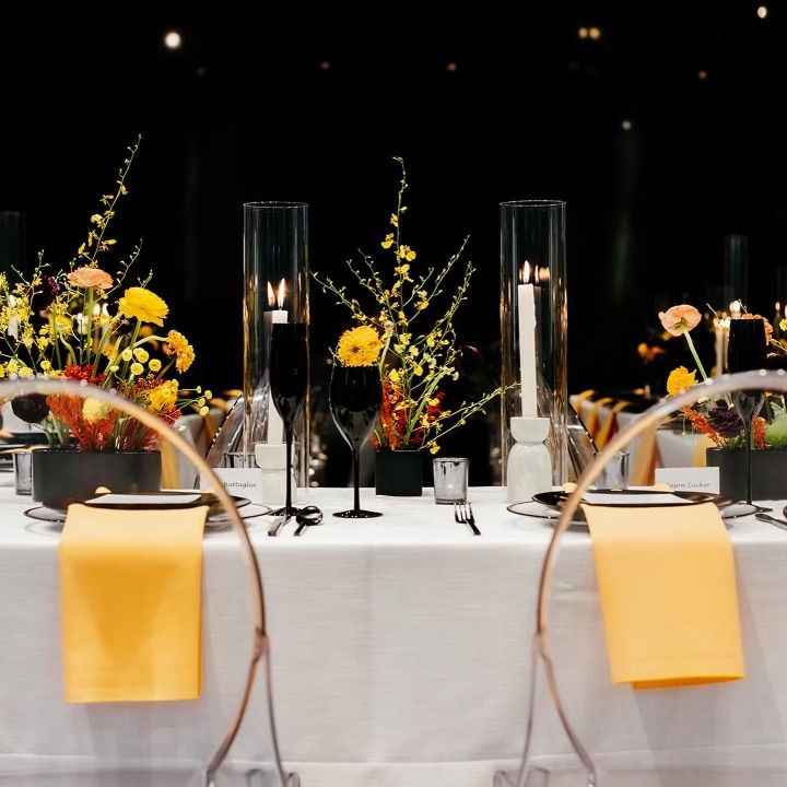Zucker Foundation - table setting with candles and floral