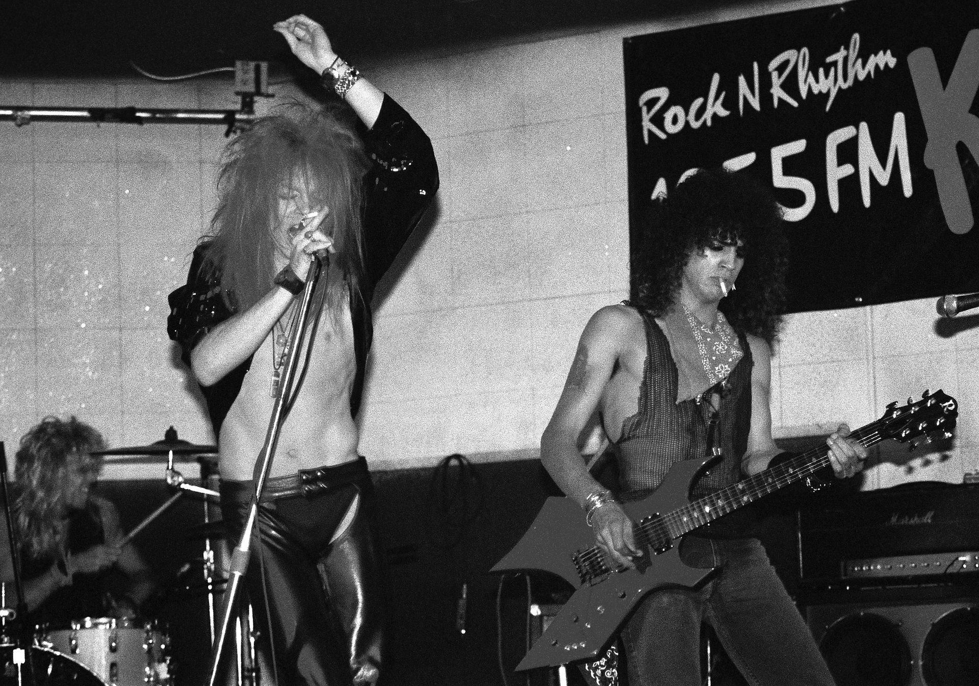Steven, Axl, and Slash of Guns N’ Roses performing for a very small crowd at Madam Wong’s East on July 4, 1985 in Los Angeles.