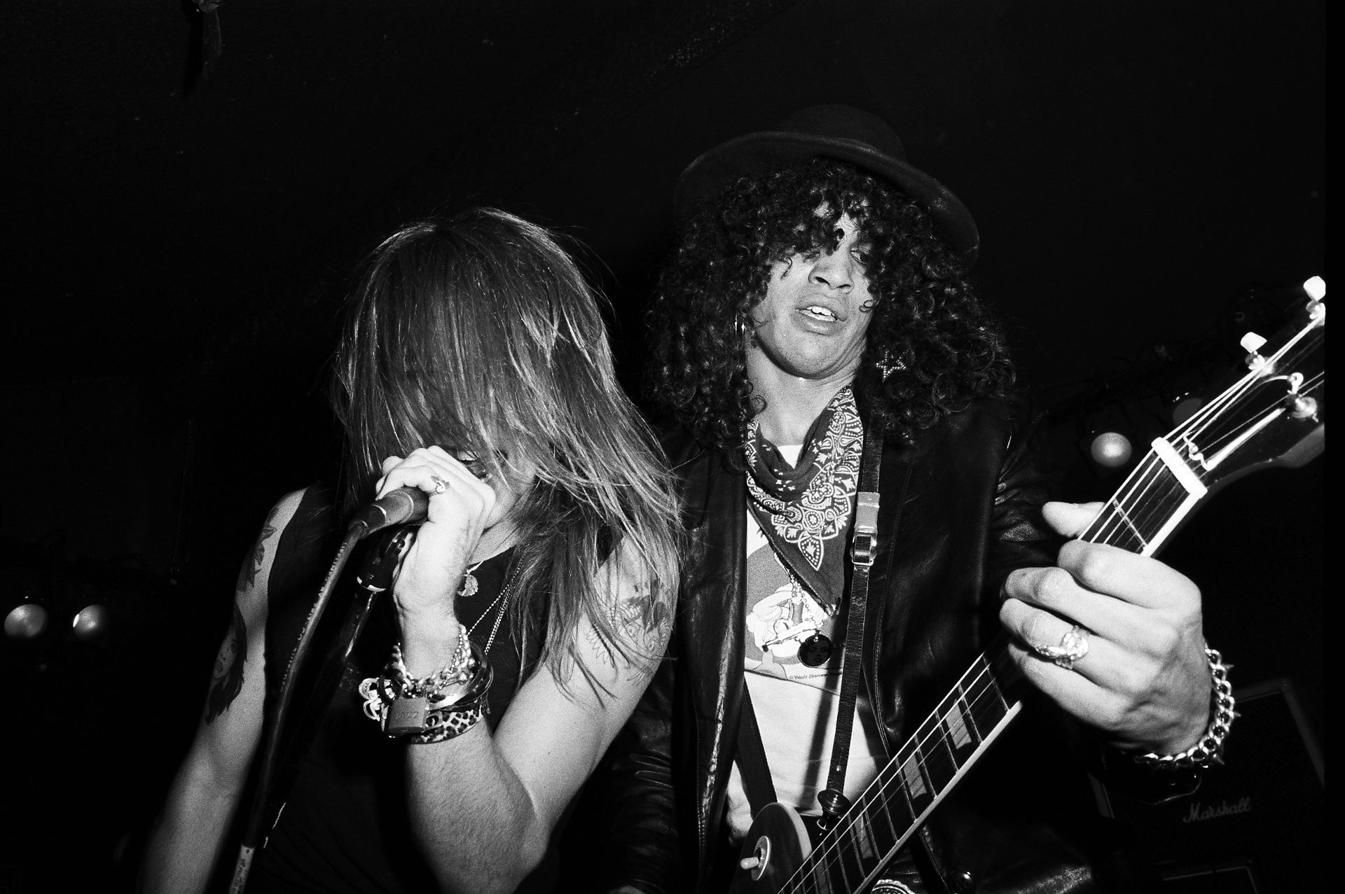 Axl and Slash of Guns N’ Roses performing at Radio City in Anaheim, California on October 31, 1985.