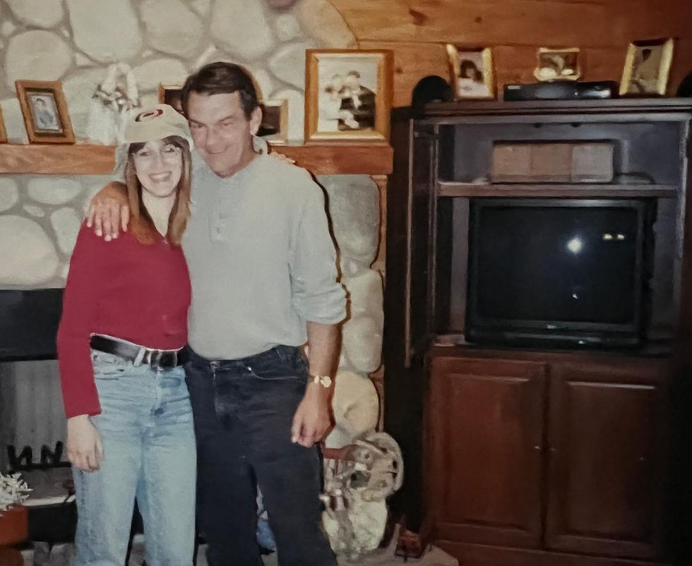 Me and my dad at his cabin in NC, circa 2000.