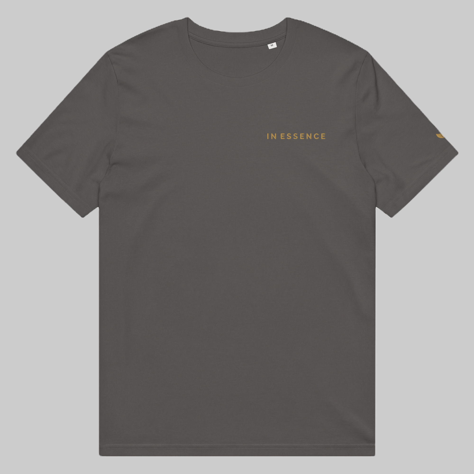 Anthracite organic cotton unisex tee with small “IN ESSENCE” chest embroidery and leaf embroidery on left sleeve.