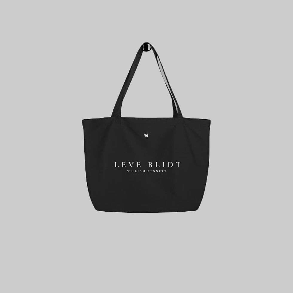 Black William Bennett organic cotton tote bag with “LEVE BLIDT” printed in white on the front, made from organic cotton.