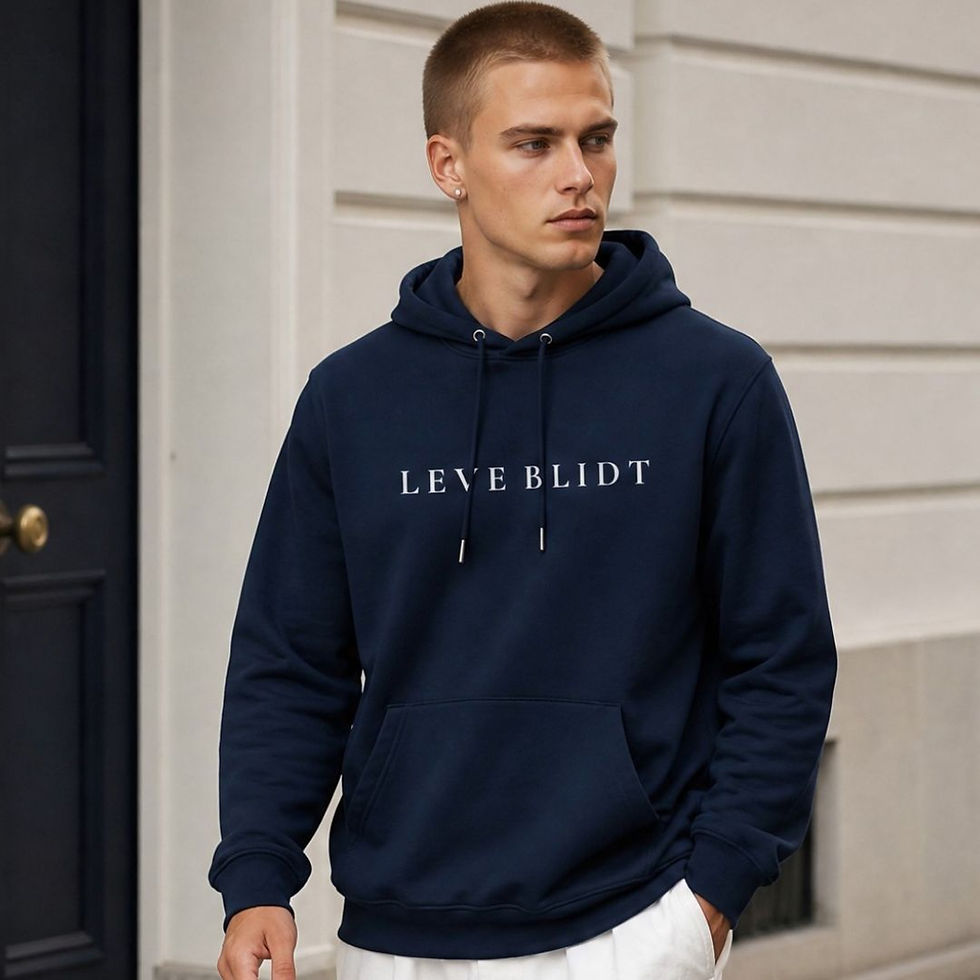 Thumbnail: Close-up of a man wearing the navy LEVE BLIDT hoodie, highlighting the relaxed fit and minimalist chest logo.