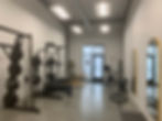24/7 gym in Manhattan, Kansas with heavy weight training equipment.
