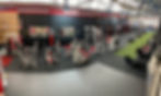 Eye-level view of a gym treadmill ready for use