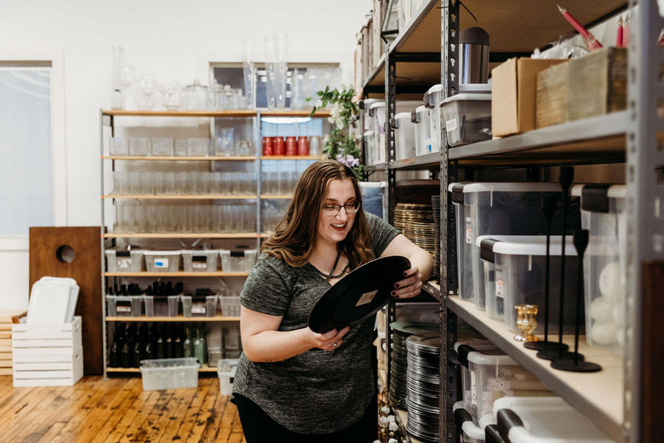 Alli examines a charger plate