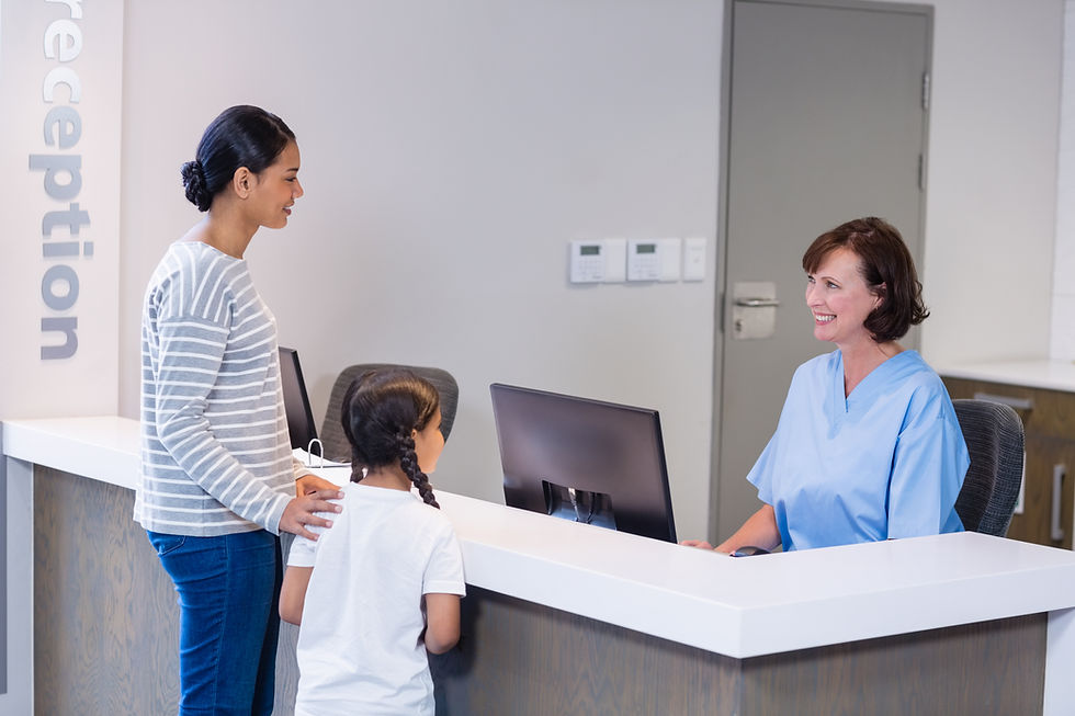 nurse-talking-with-a-patient-at-counter-2026-01-09-10-57-19-utc.jpg