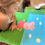 Thumbnail: Little girl looking at Peppa pillow in progress