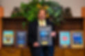 Dr. Aziz holding Cincinnati Magazine Top Doctors 2022 plaque