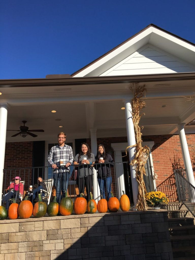 Christian, Sam, and I stand on the patio of the Crabtree General Store.
