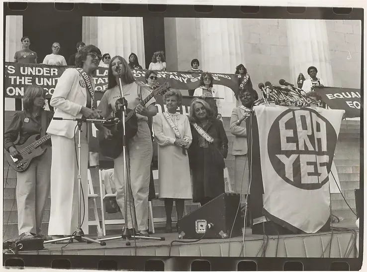 1 at national ERA rally with Betty Ford, Betty Friedan, many others.webp
