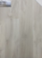 Sand Dollar waterproof SPC luxury vinyl plank flooring by Gaia with a light beach-inspired wood look