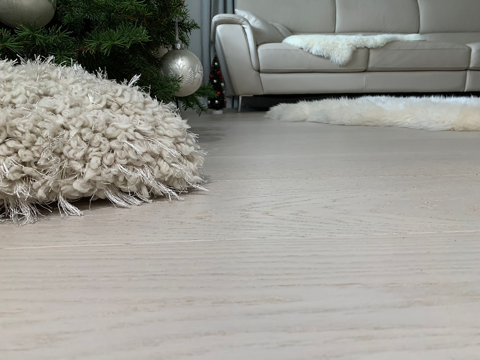 light-colored wood flooring in living room