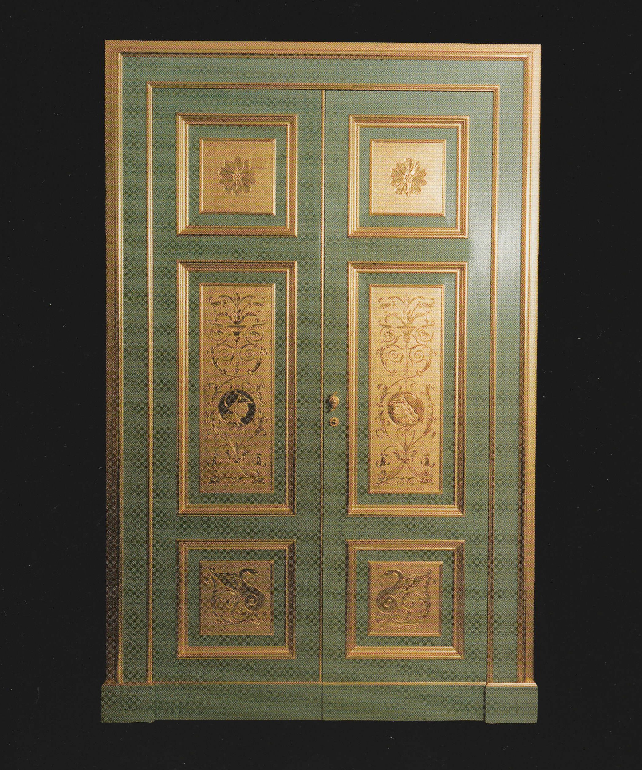 WOODEN DOOR GILDED WITH 23.3/4 CARAT
