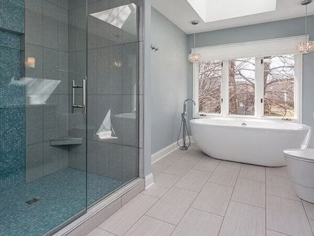 Luxury bathroom remodel with freestanding soaking tub and custom glass shower in New Braunfels TX