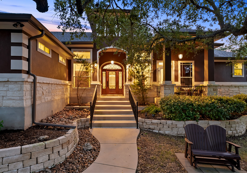 Custom home exterior in Central Texas showing high-quality residential construction and landscaping