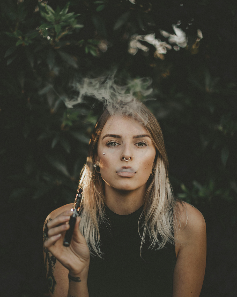 Smoke Mart - Woman Smoking