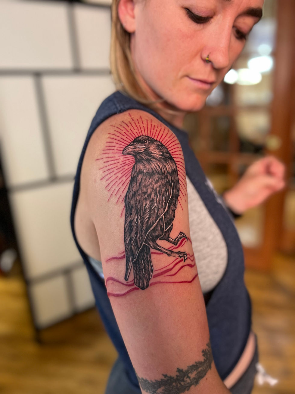 Raven with sun burst