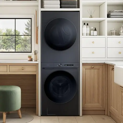 Stacked Black washer and dryer