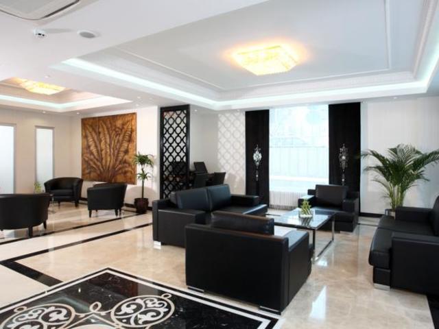 Lobby at Asia City Hotel Istanbul — marble floors, leather seating area
