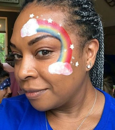 Rainbow cheek face paint
