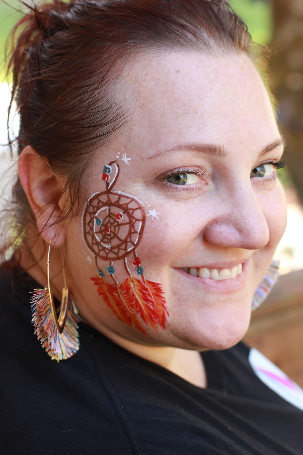 Dream catcher face paint cheek
