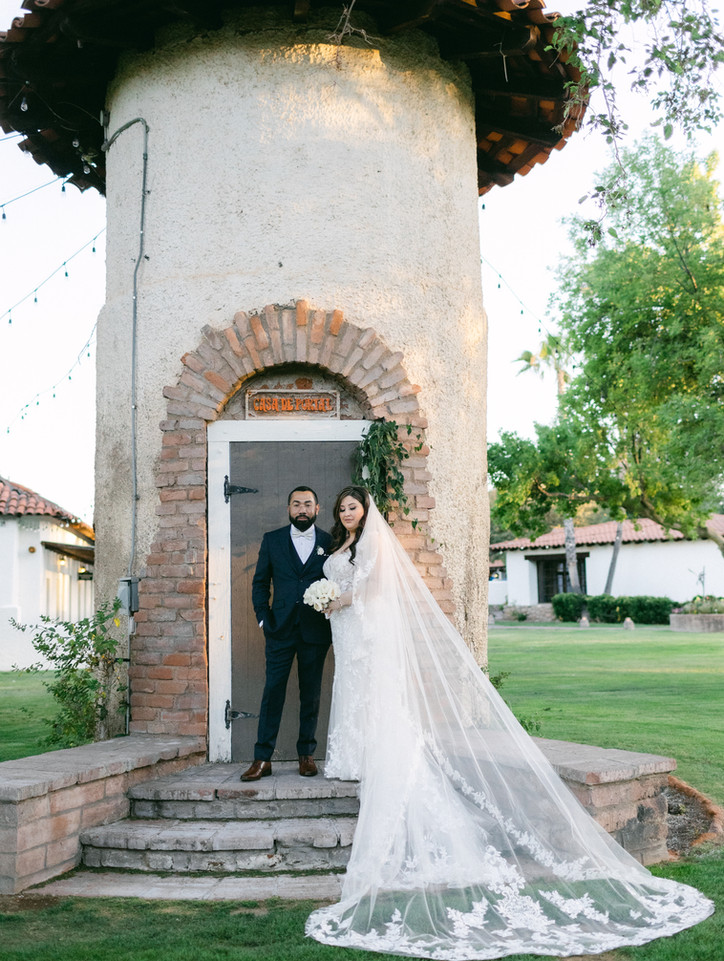 bride and groom centerpiece infront of silo at tubac golf resort and spa