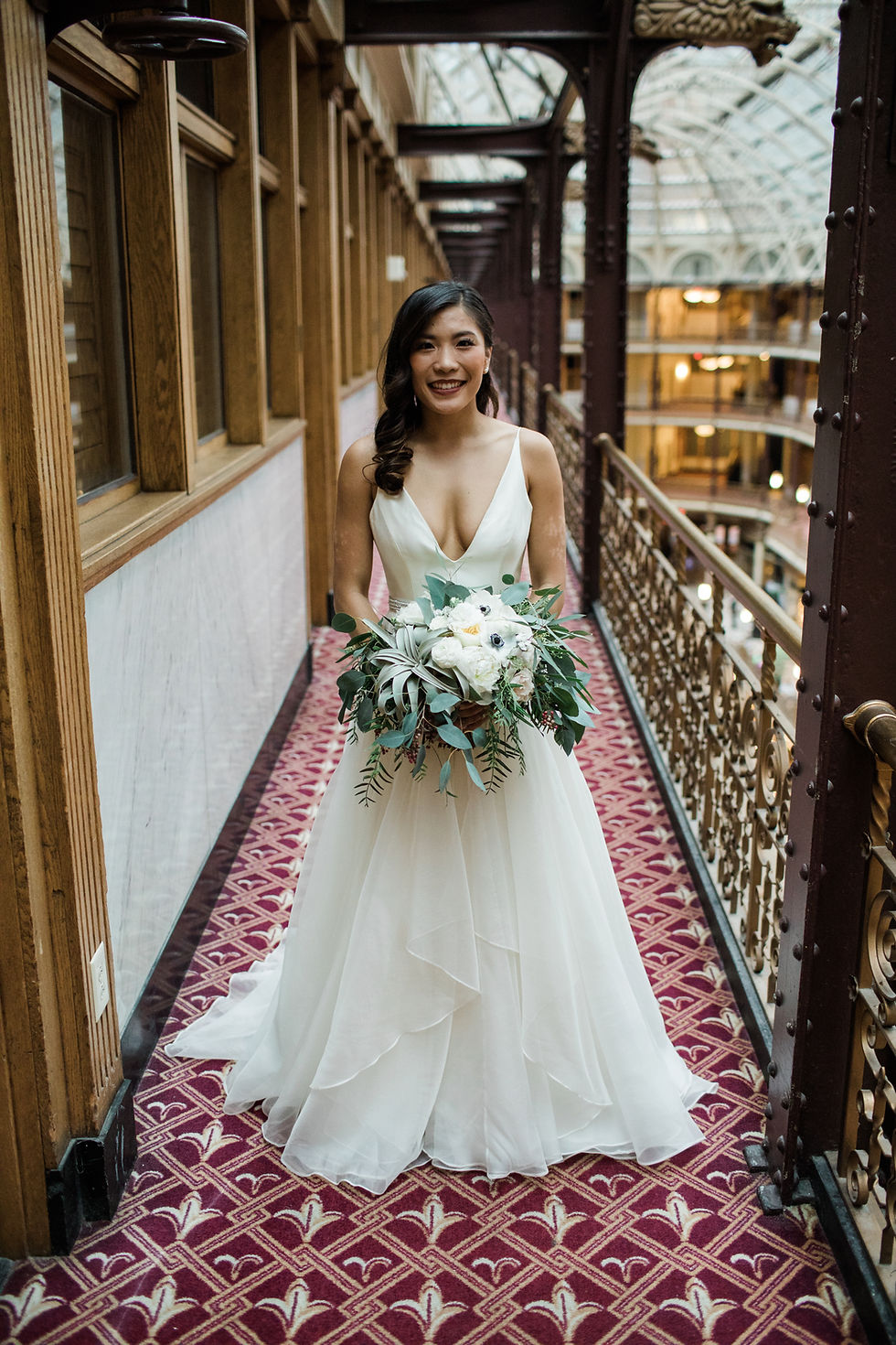 Bride bouquet with air plant in balcony at Hyatt Cleveland the arcade