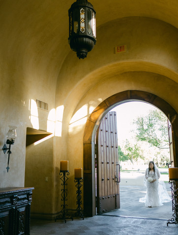 Bride entering chapel at Tubac Golf Resort and Spa