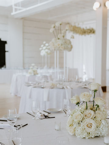 White hydrangea and white rose centerpiece at Goron Green