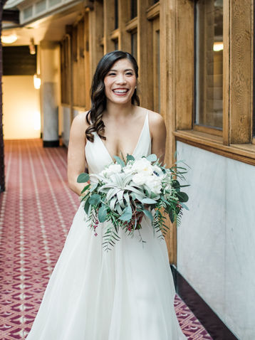Bride holding bride bouquet