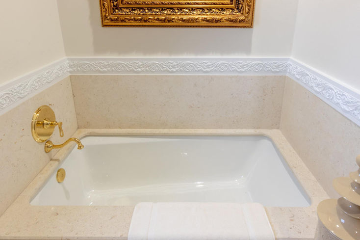 Bathtub and water heating system