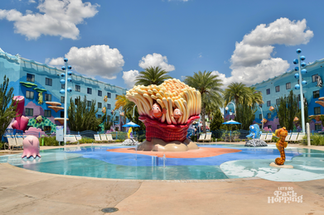 Kid splash pad with sea anemone and Nemo and Marlin sticking out. Also small octopus and seahorse