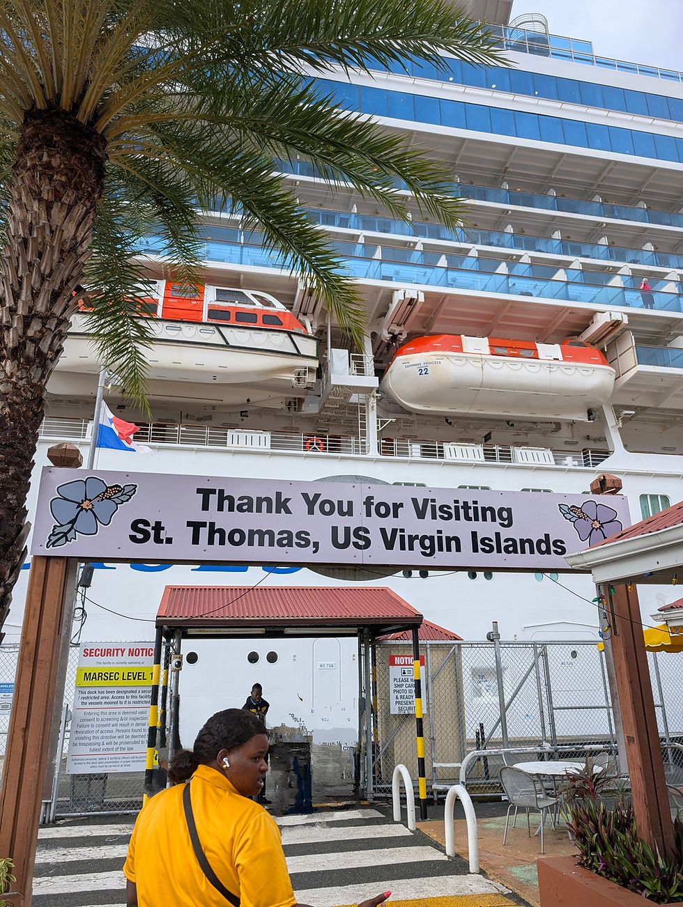 "A Warm Farewell from St. Thomas: Departing the vibrant and picturesque US Virgin Islands, this sign bids cruisers goodbye, leaving lasting memories of scenic beauty and Caribbean charm."