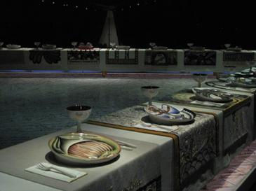 The Dinner Party is an installation artwork. Had 39 place settings for 39 historically famous women like Kali, Judith, Virginia Woolf, etc --by American feminist artist Judy Chicago, made in 1979