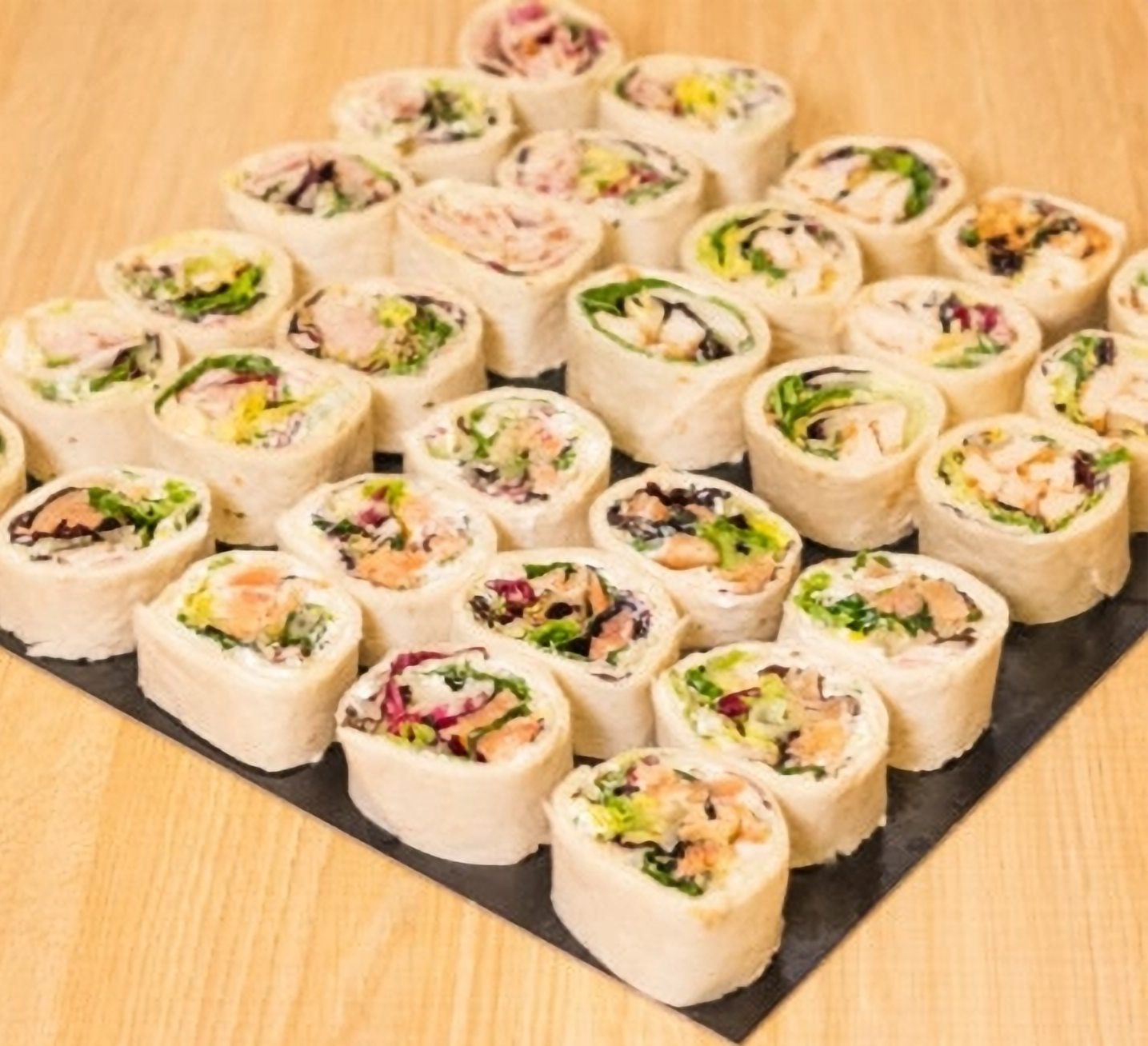 Wraps de pollo, queso y rúcula.