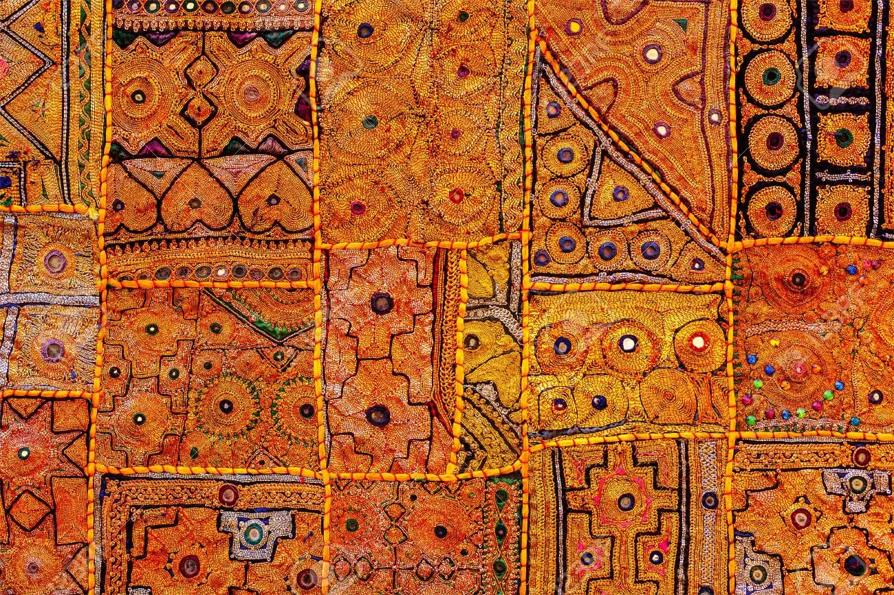 20721657-colorful-indian-fabric-textile-texture-background-patchwork-carpet-quilt-india.we
